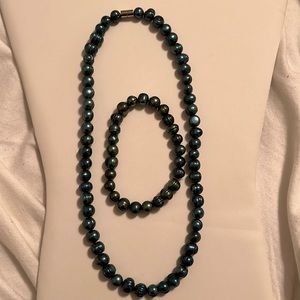 Green emerald dyed pearl necklace and bracelet set. New. $15 Just never used.
